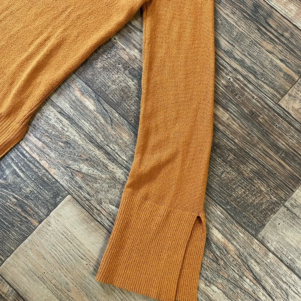 Free People criss cross tunic length Sweater with Side Slits